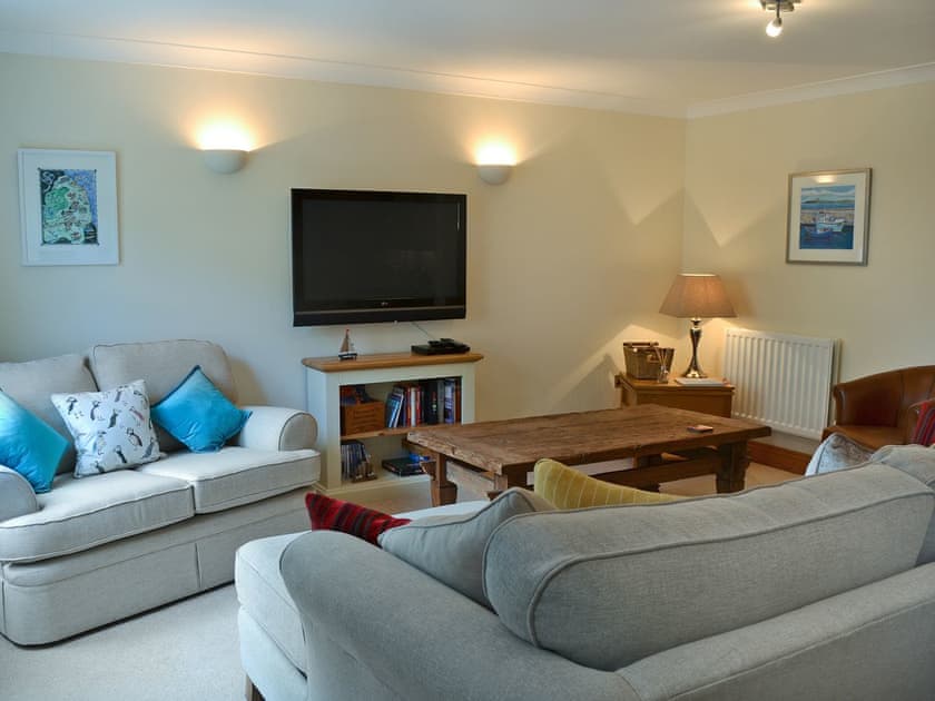 Large, comfortable living area | Lazy Puffin, Beadnell, near Alnwick