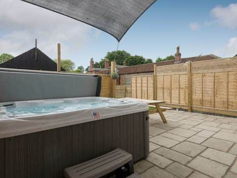 Enclosed garden with Hot tub | Haven View - Riverside Barns, Wainfleet St. Mary, near Skegness