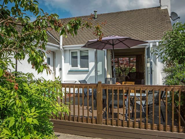 Relaxing decking with garden furniture | Briargarth, Keswick