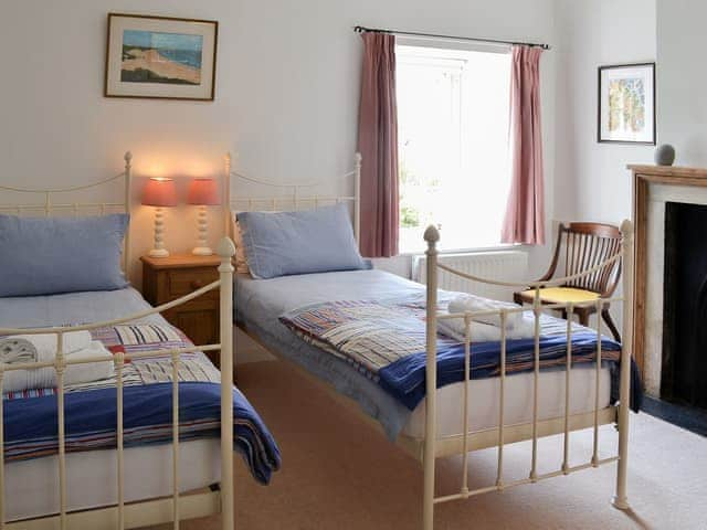 Twin bedded room with antique style beds | Fallodon Burnhouses, near Beadnell