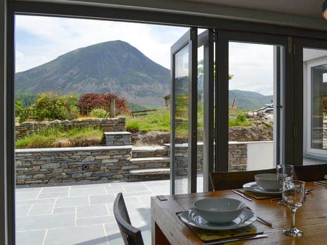 Bi-fold doors to the patio area | The Old Post Office Gillerthwaite, Loweswater, near Cockermouth