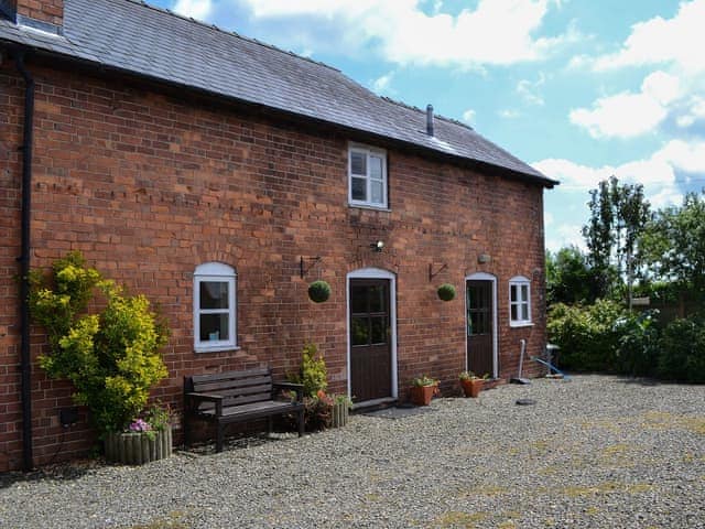 Gravelled forecourt and imposing brick-built property | The Cider Mill Cottage, Orleton, near Ludlow