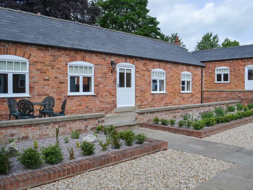 Single storey brick-built cottage in a courtyard setting | May&rsquo;s Mews - Chestnuts Farm Cottages, Binbrook, near Market Rasen