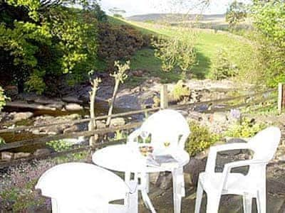 Sitting-out-area | No.2 Farfield Cottage, Sedbergh