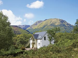 This stunning detached house was built to take full advantage of the breathtaking mountain views | Carness West, North Ballachulish, Glencoe