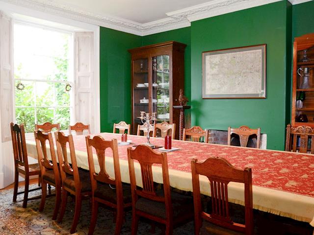 Dining room with ornate cornice and open fire | Abbotts Farm, Horbling, near Sleaford