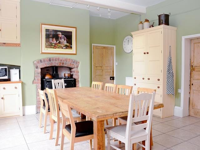 Large beamed, well-equipped, farmhouse-style kitchen | Abbotts Farm, Horbling, near Sleaford