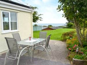 Wonderful sea views from  the patio | The Cottage, Dulas, Anglesey