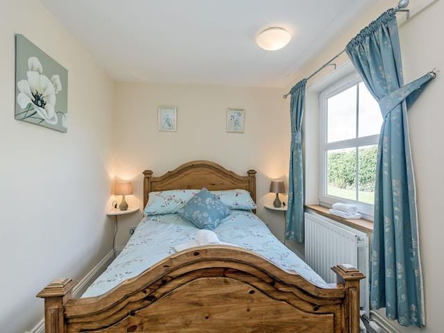 Comfortable double bedroom with river views | Wherryman&rsquo;s Cottage, Coltishall