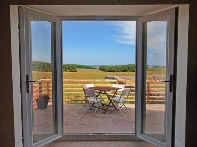 Sitting-out-area | Wandylaw Farm Lodges - Outlook Cottage, Wandylaw, nr. Bamburgh