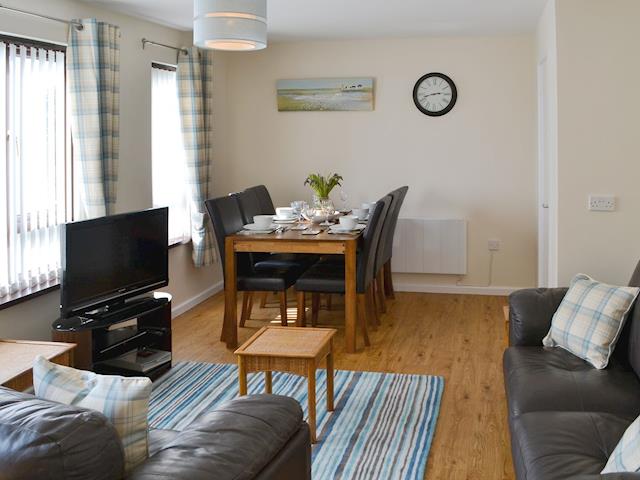 Spacious living/ dining room | Villa 55, Cromer