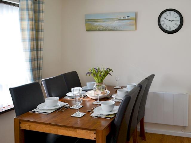 Charming dining area | Villa 55, Cromer