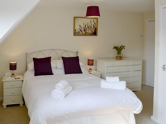 Double bedroom with an additional single | Villa 55, Cromer