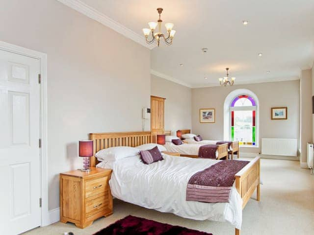 Family bedroom with en-suite shower room and feature stained glass windows | Dales Chapel, Middleton-in-Teesdale