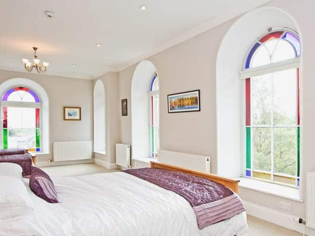 Family bedroom with en-suite shower room and feature stained glass windows | Dales Chapel, Middleton-in-Teesdale