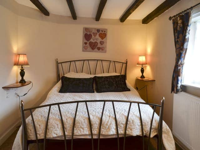 Double bedroom with beams | Childe of Hale Cottage, Hale Village