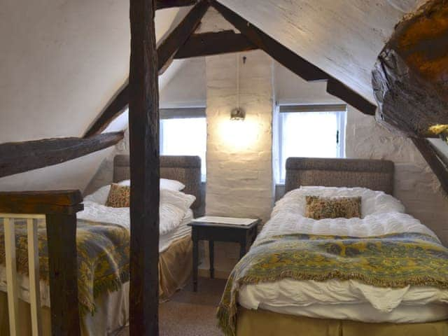 Twin bedroom with beams | Childe of Hale Cottage, Hale Village