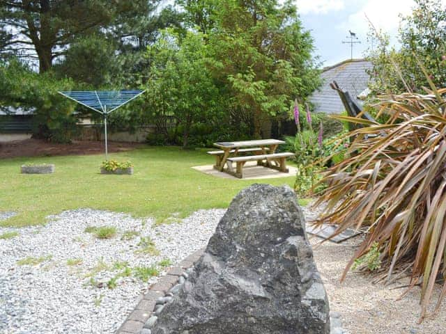 Garden with sitting-out-area | Jemima Cottage - Tregidden Farm, St Martin, near Helston