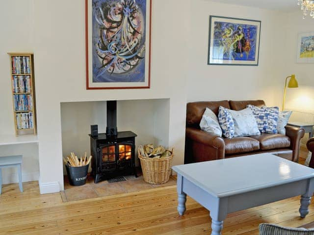 Beautifully decorated living room cosy woodburner | Woodbrook Cottage, Bothenhampton, near Bridport