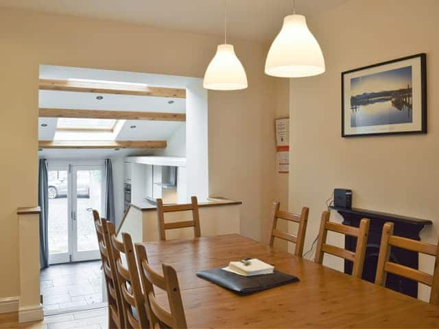 Open plan design connecting dining area to kitchen | Falcon Crag, Keswick