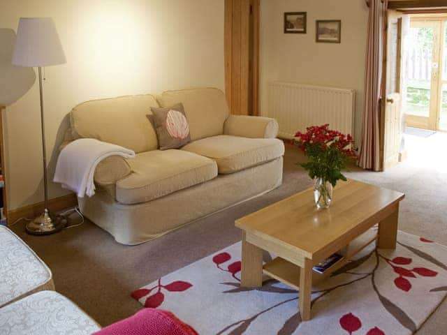 Comfortable lounge | Stable Cottage, Greystoke Gill