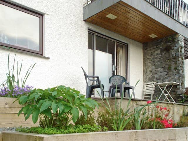 Sitting out area on terrace at front of property | Three Fells, Ambleside