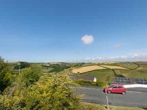 Panoramic views across the countryside towards Marlborough from the balcony | Beadon Cottage, Salcombe