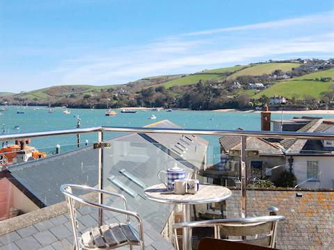 Decked balcony off kitchen with spectacular views and outdoor furniture | Quays Cottage, Salcombe