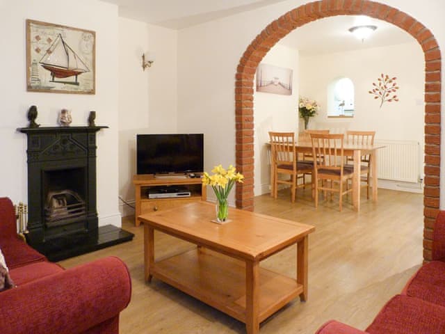 Wood-floored living/dining room | Watchkeeper’s Cottage, Mundesley