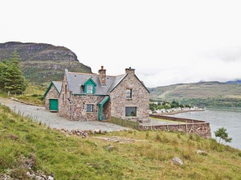 Spectacularly set close to a secluded shingle beach and private mooring | Rubha Lodge, Shieldaig