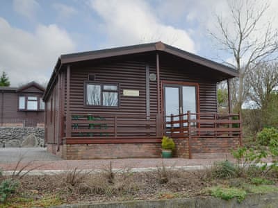 Log cabin-style holiday cottage | Catbank - Threapland Park, Moota, near Cockermouth