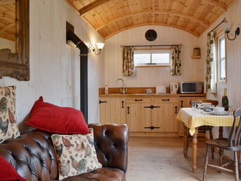Living/dining room/kitchen/bedroom | Morrells Wood Farm - Shepherds Retreat, Leighton, nr. Shrewsbury