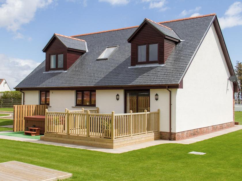 Smart modern chalet-style cottage with terrace and hot tub set in own garden | Seascape - Seascape Cottages, Southerness, near Dumfries