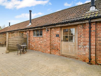 Attractive holiday home with patio and outdoor furniture | The Dairy - Milton End Farm Barns, Arlingham, near Frampton-on-Severn