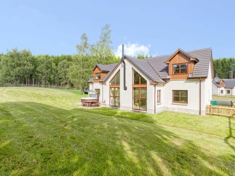 This luxurious holiday property has its very own hot tub to enjoy, in your own private garden | Birch Corner, Aviemore