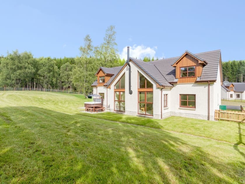 This luxurious holiday property has its very own hot tub to enjoy, in your own private garden | Birch Corner, Aviemore