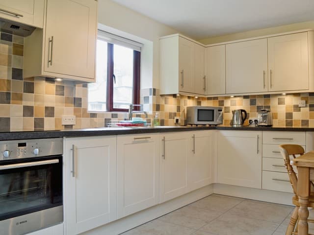 Kitchen/diner | Storrs Retreat, near Bowness on Windermere