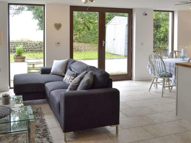 Open-plan living space with dining area, lounge and kitchen | The Old Smithy, Penelewey, near Truro