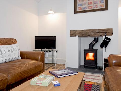 Spacious comfortable living room with wood burning stove | Ty&middot; Cai - Ty Coch Chatham, Llandwrog, near Caernarfon