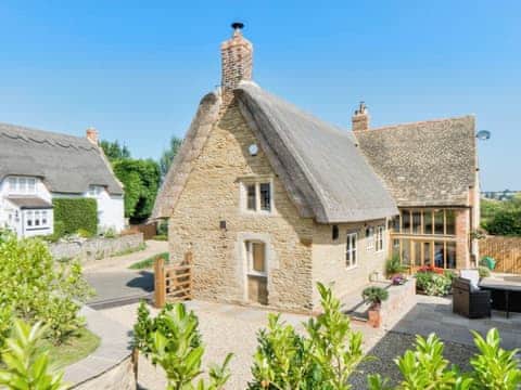 Delightful, Grade II listed, thatched stone cottage | Tom Cottage, Wing, near Oakham