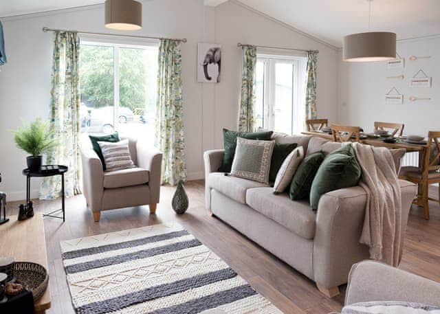 All imagery shown is a representation only. Style, decor and exact views vary by lodge. | Orchard Deluxe 3 Hot Tub Pet - Clawford Lakes Resort and Spa, Clawton, Nr Holsworthy