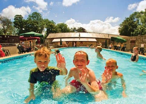 Outdoor pool | Platinum Lodge 16 - Grondre Holiday Park, Clunderwen, Nr Narberth