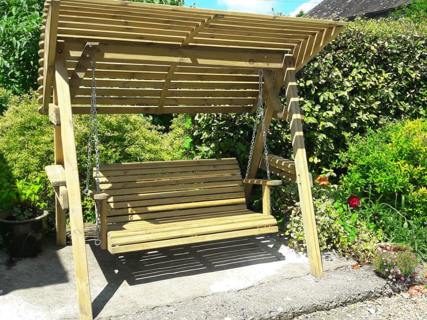 Garden seat on small patio area | Churchview House, Winterbourne Abbas, near Dorchester