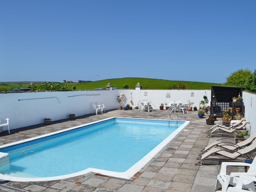 Heated outdoor swimming pool  | Barn Cottage, Goose Cottage - Quinceborough Farm, Widemouth Bay, near Bude