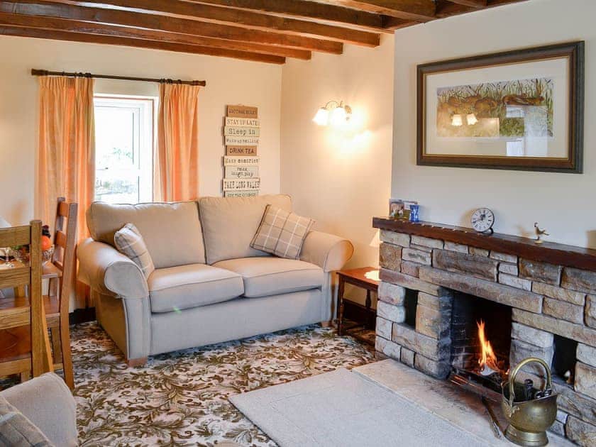 Beamed open plan living space | Swaledale Cottage - Swaledale and Ellerbeck Cottages, Caldbeck, near Keswick