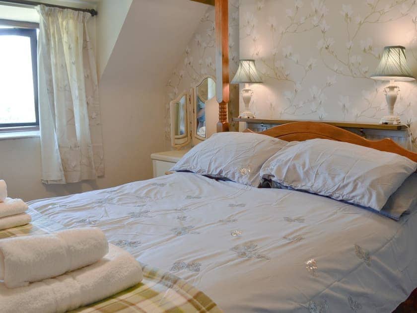 Comfortable four poster bedroom | Y Bwthyn, Llandygai, near Bangor