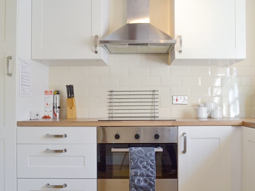 Well-equipped fitted kitchen. | Burdett’s Cottage - Foremark Cottages, Milton, near Repton
