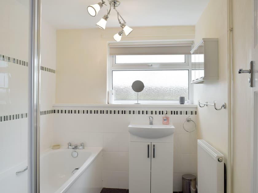 Family bathroom with shower over bath | Rose Farm Cottage, Frostenden, near Beccles