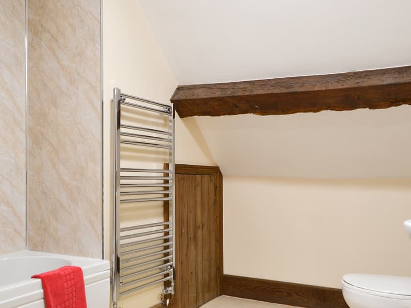 Bathroom with shower over bath | Little Brampton Farmhouse, Clunbury, near Ludlow