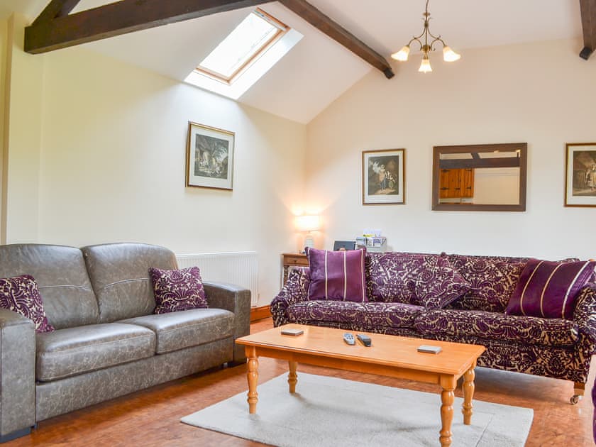 Cosy and comfortable beamed living/dining room | The Old Sawmill, Clunbury, near Ludlow